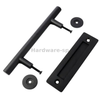  Professional installation of a barn door track system, demonstrating step-by-step hardware setup